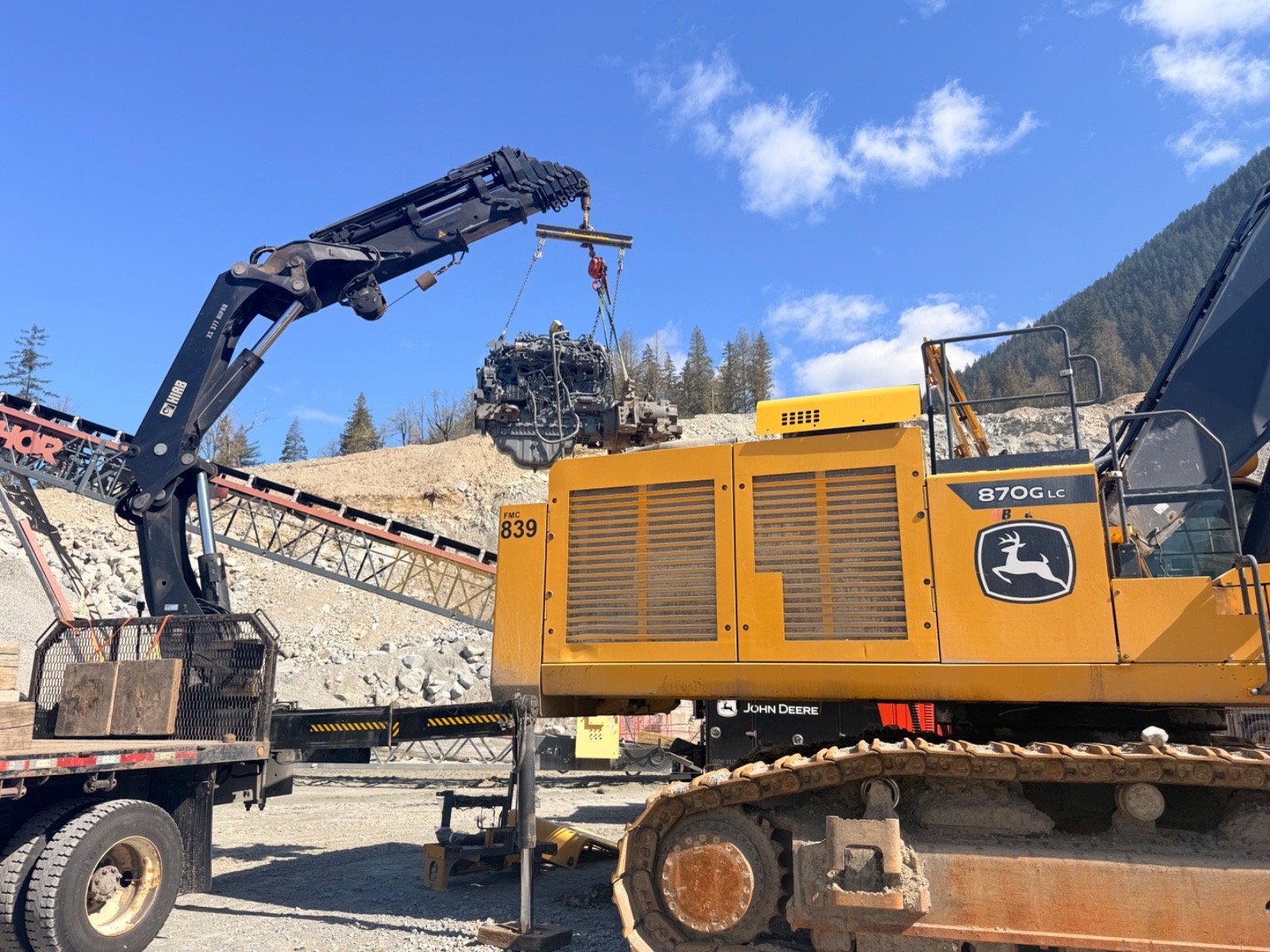 Engine swap on a John Deere 870G excavator